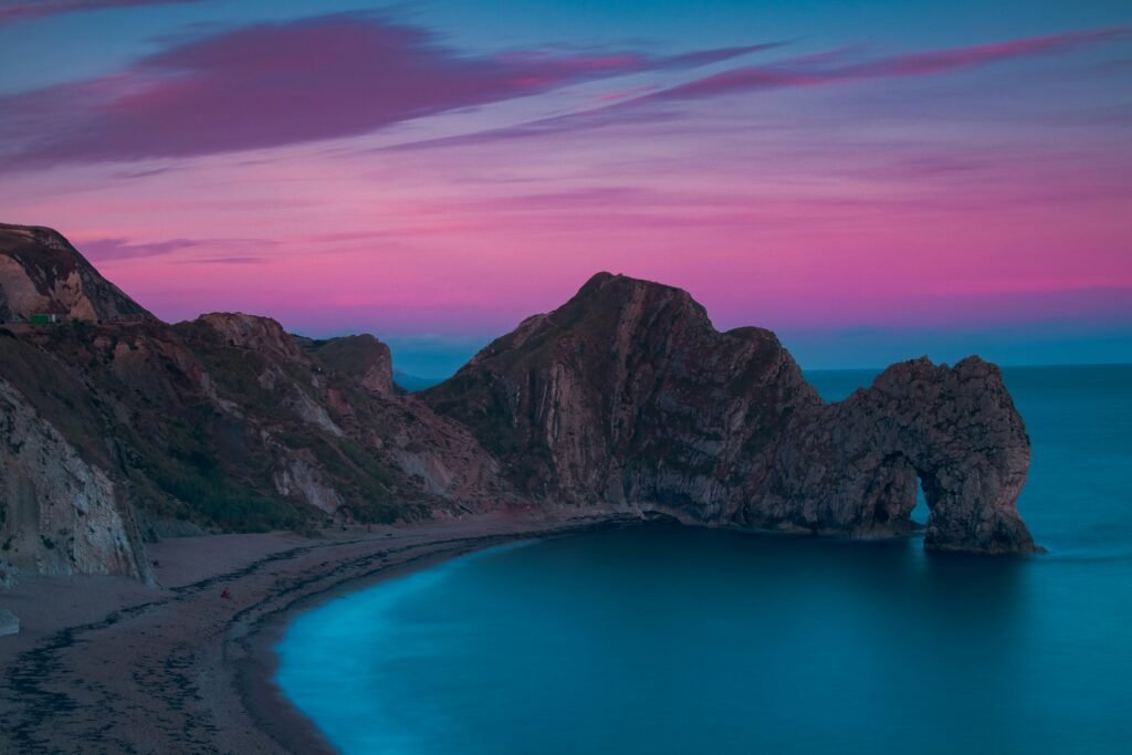 Durdle Door with a purple night sky